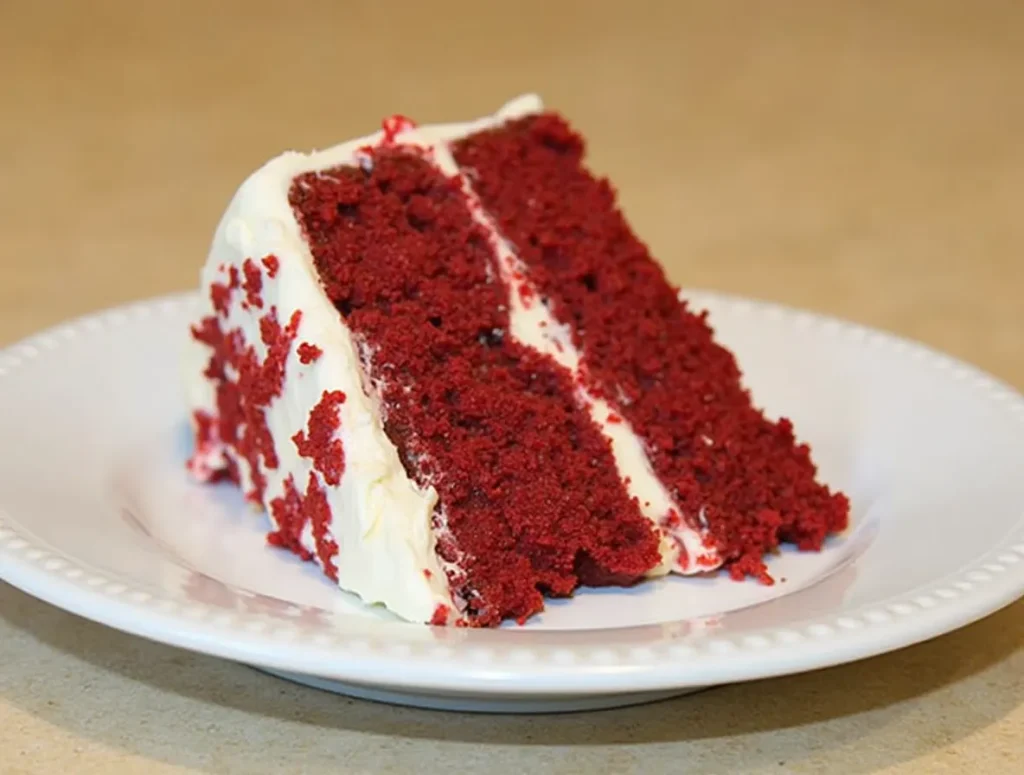 a slice of red velvet cake on a plate